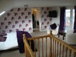 Alternative image of finished loft area fully decorated in Wigan